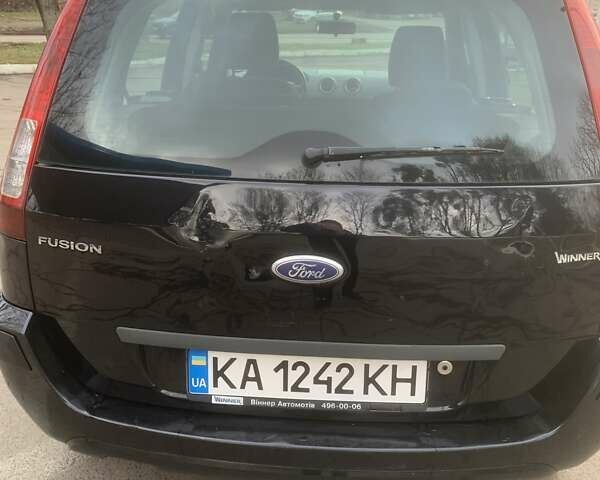 Черный Форд Фьюжн, объемом двигателя 1.39 л и пробегом 192 тыс. км за 4300 $, фото 8 на Automoto.ua