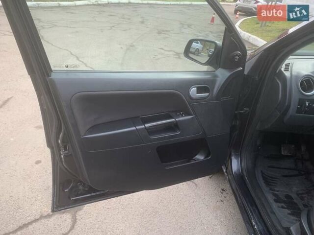 Черный Форд Фьюжн, объемом двигателя 1.39 л и пробегом 192 тыс. км за 4300 $, фото 9 на Automoto.ua