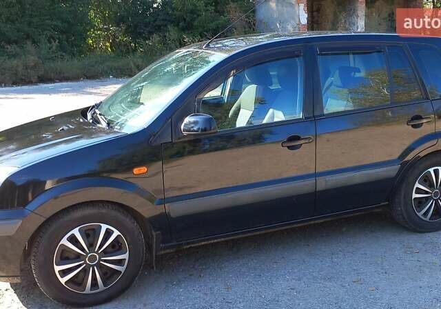 Чорний Форд Фьюжен, об'ємом двигуна 1.6 л та пробігом 312 тис. км за 4900 $, фото 6 на Automoto.ua