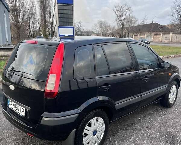 Черный Форд Фьюжн, объемом двигателя 1.6 л и пробегом 215 тыс. км за 4499 $, фото 7 на Automoto.ua