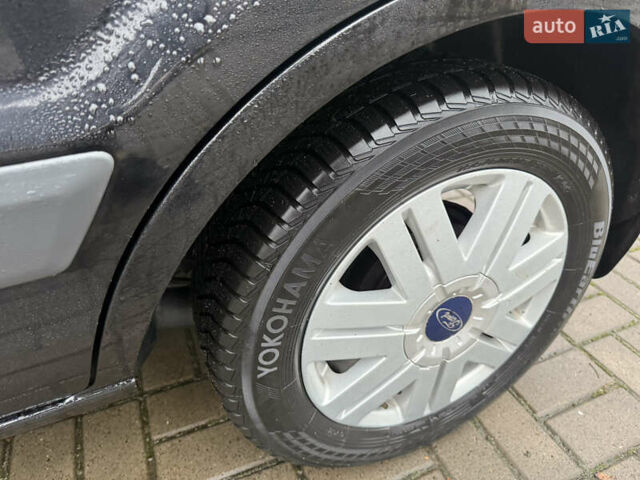 Черный Форд Фьюжн, объемом двигателя 1.6 л и пробегом 147 тыс. км за 4300 $, фото 12 на Automoto.ua