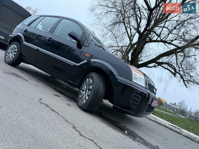 Черный Форд Фьюжн, объемом двигателя 1.4 л и пробегом 174 тыс. км за 6000 $, фото 13 на Automoto.ua