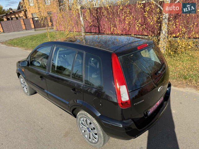 Чорний Форд Фьюжен, об'ємом двигуна 1.4 л та пробігом 174 тис. км за 6000 $, фото 14 на Automoto.ua