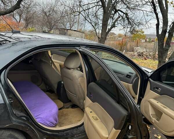 Черный Форд Фьюжн, объемом двигателя 2.49 л и пробегом 332 тыс. км за 6000 $, фото 6 на Automoto.ua