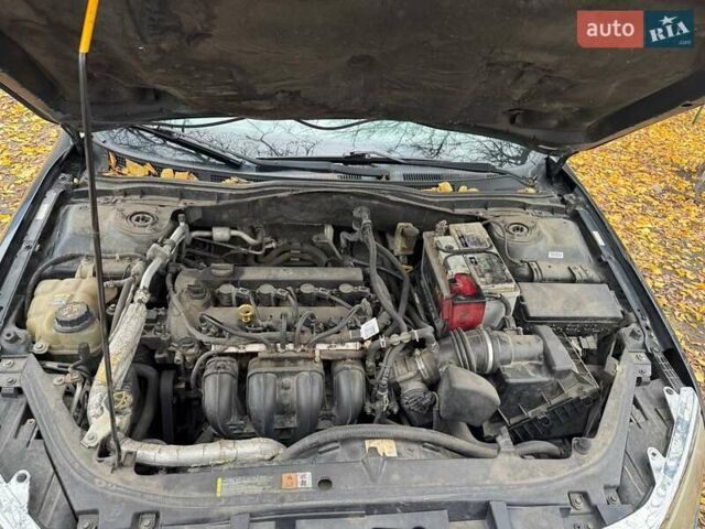 Черный Форд Фьюжн, объемом двигателя 2.49 л и пробегом 332 тыс. км за 6000 $, фото 5 на Automoto.ua