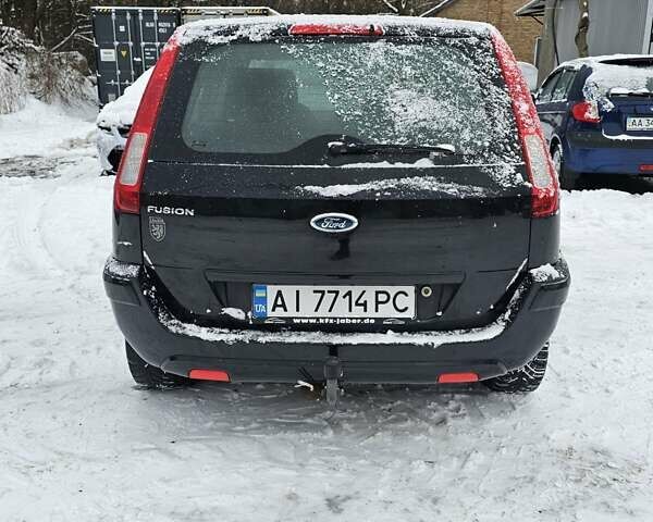 Черный Форд Фьюжн, объемом двигателя 1.39 л и пробегом 160 тыс. км за 1800 $, фото 7 на Automoto.ua