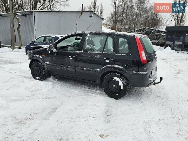 Черный Форд Фьюжн, объемом двигателя 1.39 л и пробегом 160 тыс. км за 2000 $, фото 7 на Automoto.ua