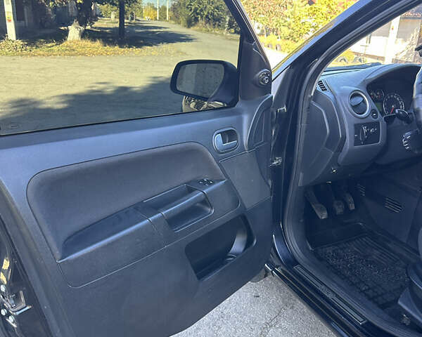 Черный Форд Фьюжн, объемом двигателя 1.39 л и пробегом 320 тыс. км за 4500 $, фото 7 на Automoto.ua