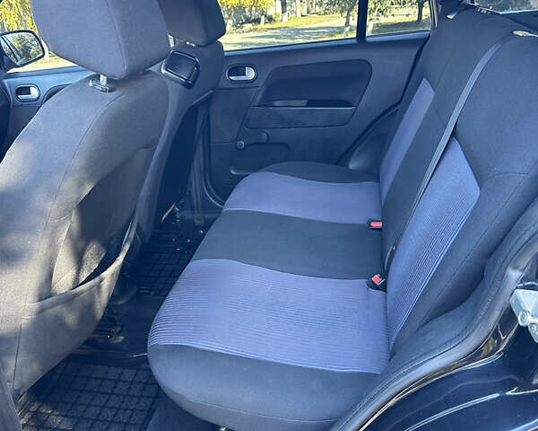 Черный Форд Фьюжн, объемом двигателя 1.39 л и пробегом 320 тыс. км за 4500 $, фото 8 на Automoto.ua