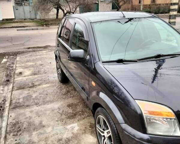 Черный Форд Фьюжн, объемом двигателя 1.4 л и пробегом 92 тыс. км за 5000 $, фото 5 на Automoto.ua