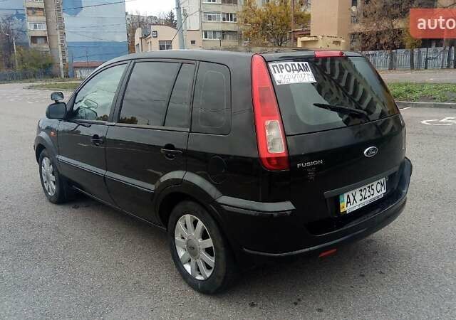Черный Форд Фьюжн, объемом двигателя 1.6 л и пробегом 213 тыс. км за 6200 $, фото 2 на Automoto.ua