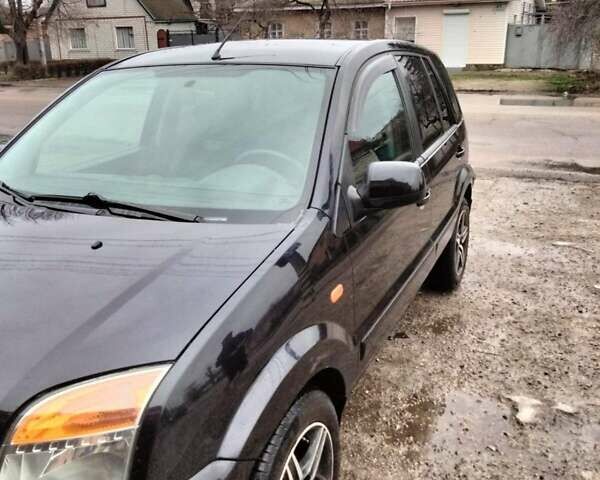 Черный Форд Фьюжн, объемом двигателя 1.4 л и пробегом 92 тыс. км за 5000 $, фото 6 на Automoto.ua