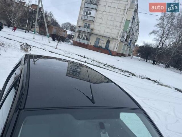 Черный Форд Фьюжн, объемом двигателя 1.6 л и пробегом 145 тыс. км за 5999 $, фото 13 на Automoto.ua