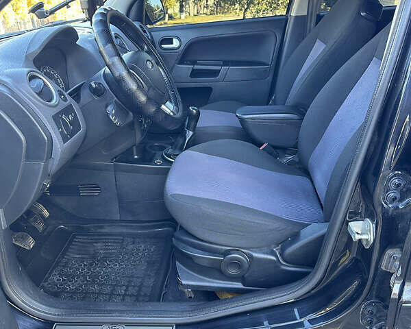 Черный Форд Фьюжн, объемом двигателя 1.39 л и пробегом 320 тыс. км за 4500 $, фото 6 на Automoto.ua