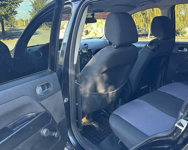 Черный Форд Фьюжн, объемом двигателя 1.39 л и пробегом 320 тыс. км за 4500 $, фото 9 на Automoto.ua