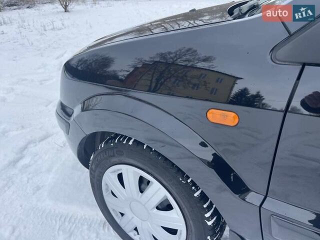 Черный Форд Фьюжн, объемом двигателя 1.6 л и пробегом 145 тыс. км за 5999 $, фото 11 на Automoto.ua