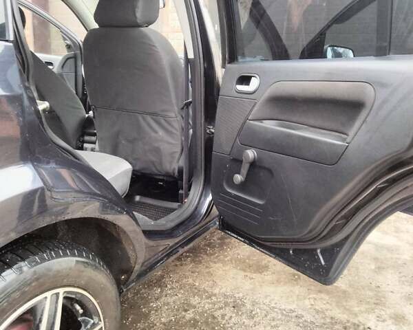 Черный Форд Фьюжн, объемом двигателя 1.4 л и пробегом 92 тыс. км за 5000 $, фото 10 на Automoto.ua