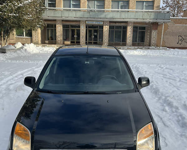 Чорний Форд Фьюжен, об'ємом двигуна 1.6 л та пробігом 143 тис. км за 6350 $, фото 14 на Automoto.ua