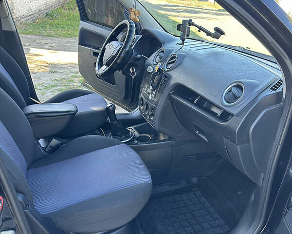 Черный Форд Фьюжн, объемом двигателя 1.39 л и пробегом 320 тыс. км за 4500 $, фото 10 на Automoto.ua