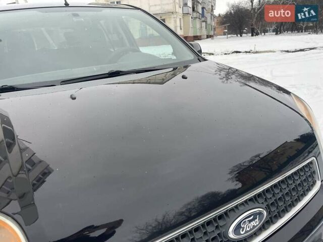 Черный Форд Фьюжн, объемом двигателя 1.6 л и пробегом 145 тыс. км за 5999 $, фото 14 на Automoto.ua