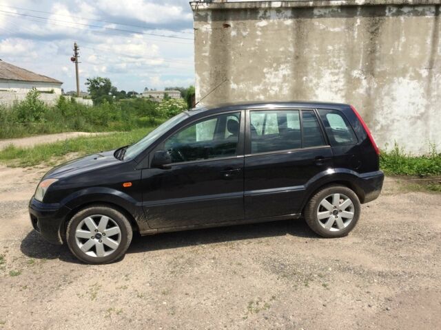 Черный Форд Фьюжн, объемом двигателя 1.4 л и пробегом 198 тыс. км за 5500 $, фото 2 на Automoto.ua