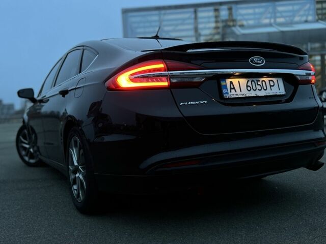 Чорний Форд Фьюжен, об'ємом двигуна 2.5 л та пробігом 225 тис. км за 10900 $, фото 12 на Automoto.ua