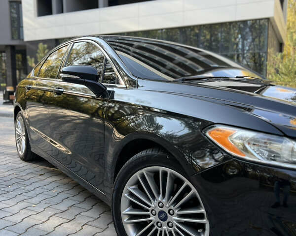 Чорний Форд Фьюжен, об'ємом двигуна 2 л та пробігом 177 тис. км за 10650 $, фото 10 на Automoto.ua