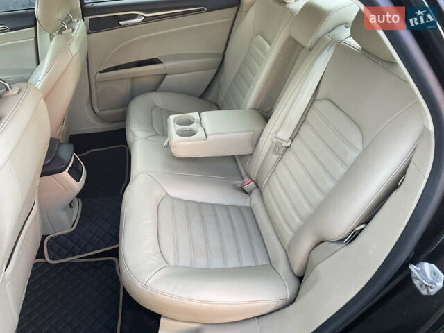 Черный Форд Фьюжн, объемом двигателя 2 л и пробегом 320 тыс. км за 8900 $, фото 12 на Automoto.ua