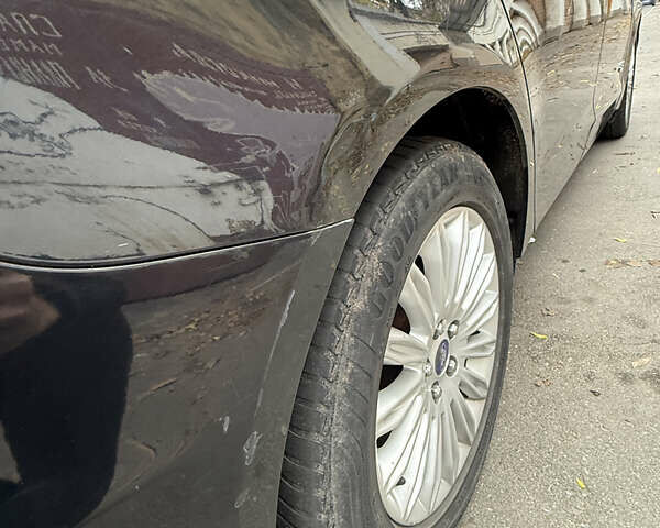 Черный Форд Фьюжн, объемом двигателя 2 л и пробегом 320 тыс. км за 9200 $, фото 5 на Automoto.ua