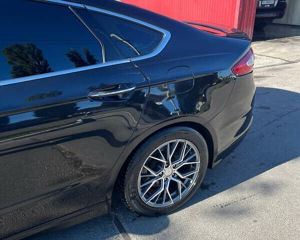 Чорний Форд Фьюжен, об'ємом двигуна 2 л та пробігом 180 тис. км за 11300 $, фото 1 на Automoto.ua