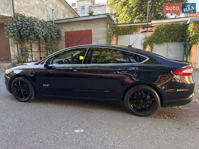 Черный Форд Фьюжн, объемом двигателя 2 л и пробегом 234 тыс. км за 12600 $, фото 7 на Automoto.ua