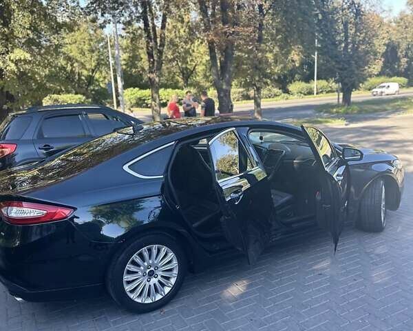 Черный Форд Фьюжн, объемом двигателя 2 л и пробегом 230 тыс. км за 10000 $, фото 12 на Automoto.ua