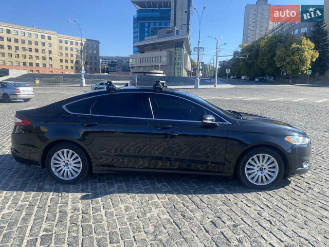Чорний Форд Фьюжен, об'ємом двигуна 2 л та пробігом 151 тис. км за 10800 $, фото 5 на Automoto.ua