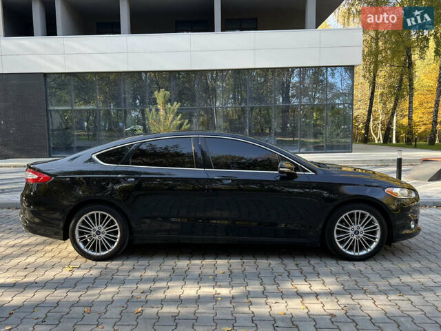 Чорний Форд Фьюжен, об'ємом двигуна 2 л та пробігом 177 тис. км за 10650 $, фото 25 на Automoto.ua