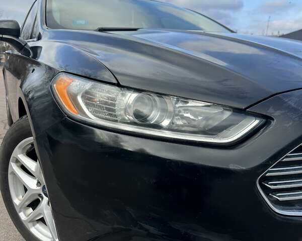 Черный Форд Фьюжн, объемом двигателя 2.5 л и пробегом 223 тыс. км за 8400 $, фото 2 на Automoto.ua