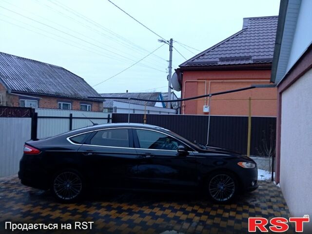 Черный Форд Фьюжн, объемом двигателя 20 л и пробегом 206 тыс. км за 10500 $, фото 3 на Automoto.ua