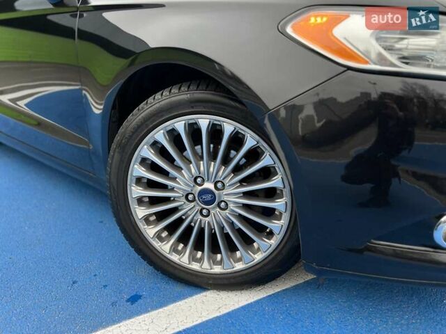 Черный Форд Фьюжн, объемом двигателя 2 л и пробегом 218 тыс. км за 11999 $, фото 7 на Automoto.ua