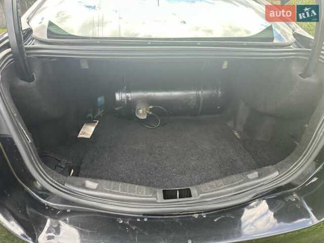 Черный Форд Фьюжн, объемом двигателя 2.49 л и пробегом 170 тыс. км за 9400 $, фото 6 на Automoto.ua