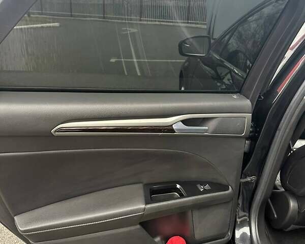 Чорний Форд Фьюжен, об'ємом двигуна 2 л та пробігом 193 тис. км за 10600 $, фото 9 на Automoto.ua