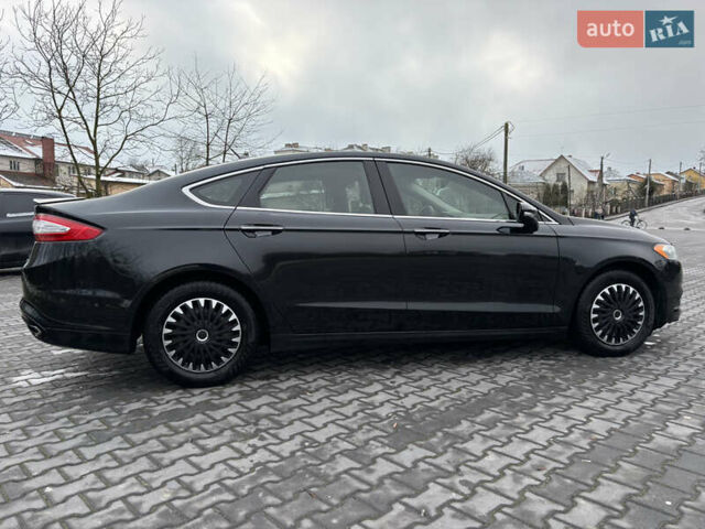 Чорний Форд Фьюжен, об'ємом двигуна 2 л та пробігом 196 тис. км за 9600 $, фото 4 на Automoto.ua