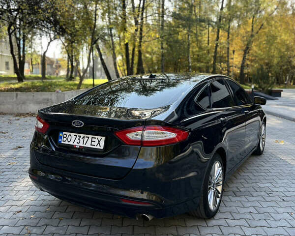 Чорний Форд Фьюжен, об'ємом двигуна 2 л та пробігом 177 тис. км за 10650 $, фото 17 на Automoto.ua