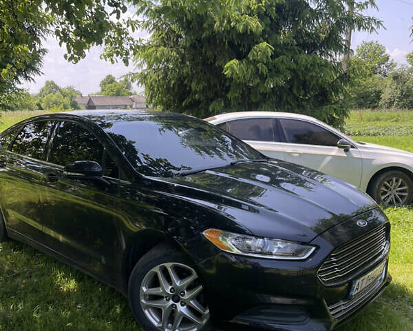 Черный Форд Фьюжн, объемом двигателя 2.5 л и пробегом 200 тыс. км за 7850 $, фото 1 на Automoto.ua