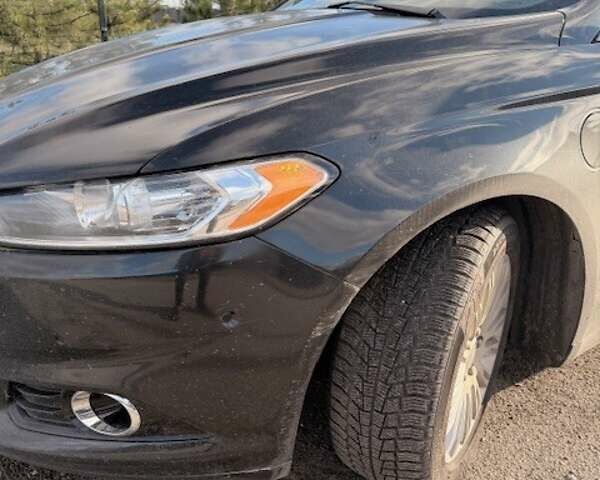 Черный Форд Фьюжн, объемом двигателя 2 л и пробегом 217 тыс. км за 11950 $, фото 1 на Automoto.ua