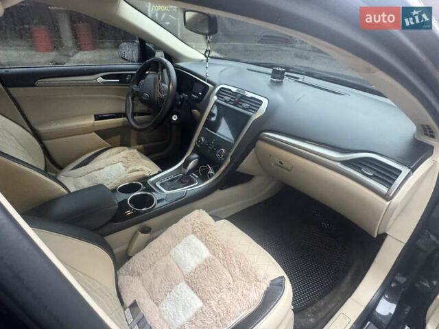 Черный Форд Фьюжн, объемом двигателя 2.4 л и пробегом 240 тыс. км за 8700 $, фото 8 на Automoto.ua