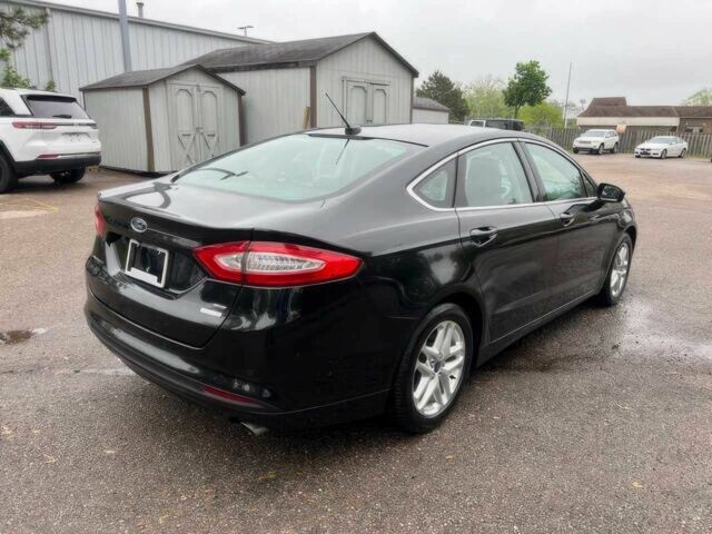 Черный Форд Фьюжн, объемом двигателя 1.6 л и пробегом 90 тыс. км за 8000 $, фото 3 на Automoto.ua