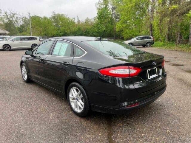 Черный Форд Фьюжн, объемом двигателя 1.6 л и пробегом 90 тыс. км за 8000 $, фото 2 на Automoto.ua