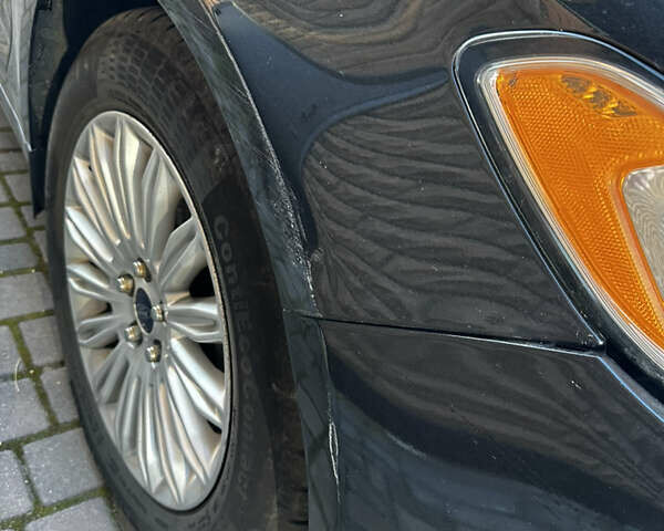 Чорний Форд Фьюжен, об'ємом двигуна 2 л та пробігом 262 тис. км за 8150 $, фото 4 на Automoto.ua