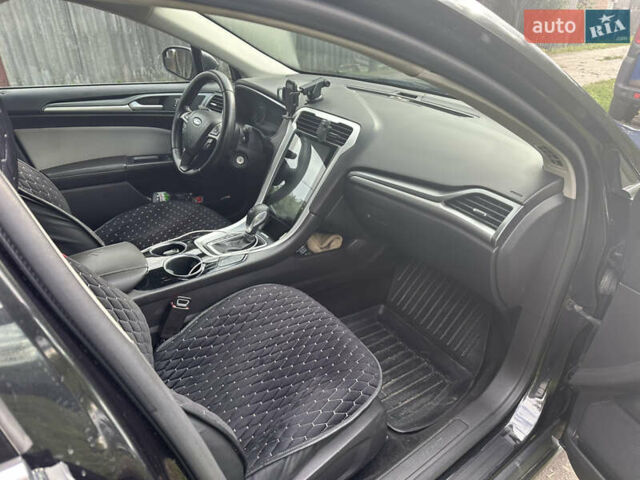 Черный Форд Фьюжн, объемом двигателя 2.49 л и пробегом 170 тыс. км за 9400 $, фото 4 на Automoto.ua