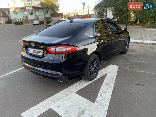 Черный Форд Фьюжн, объемом двигателя 2.49 л и пробегом 220 тыс. км за 9000 $, фото 5 на Automoto.ua