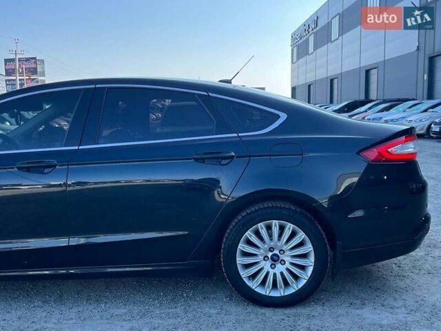 Чорний Форд Фьюжен, об'ємом двигуна 2 л та пробігом 216 тис. км за 11390 $, фото 11 на Automoto.ua